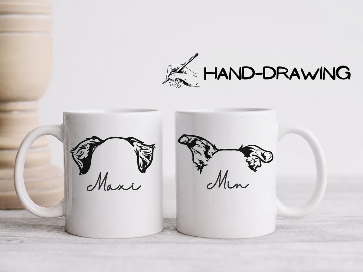 Two white ceramic mugs on a light surface, each printed with a black hand-drawn fish illustration and a script name underneath, one reading 'Maxi' and the other 'Min'. Above the mugs is a graphic with a hand drawing tool and the text 'HAND-DRAWING'.