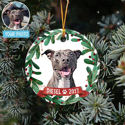 Custom dog ornament hanging on a Christmas tree with photo example and name Diesel