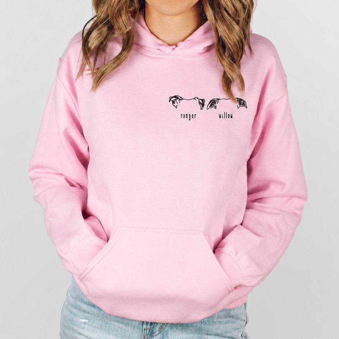 Pink custom pet hoodie showing two minimalist pet illustrations labeled Ranger and Willow