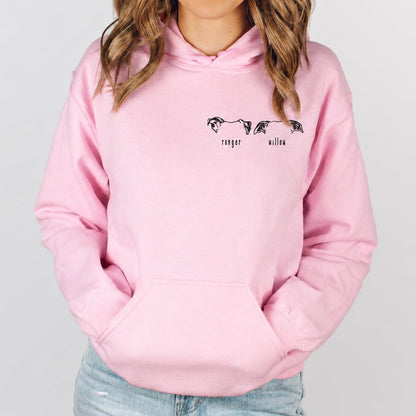 Pink custom pet hoodie showing two minimalist pet illustrations labeled Ranger and Willow