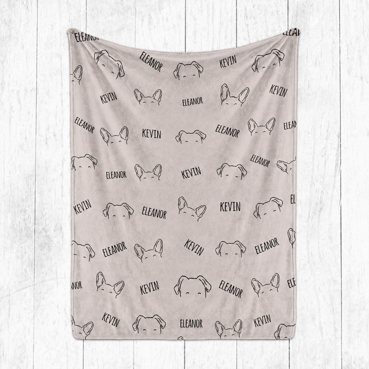 Neutral custom pet blanket with repeated floppy and pointed ear outlines and Eleanor and Kevin names