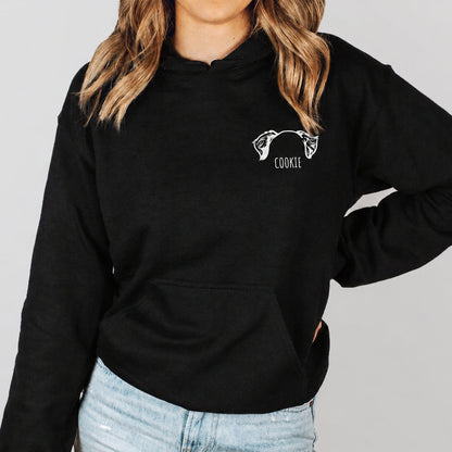 Black custom pet hoodie with a white pet ears illustration labeled Cookie