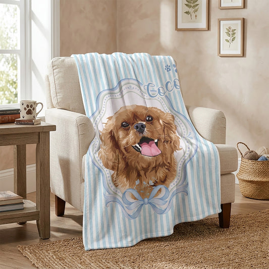 Blue striped personalized blanket with a cheerful curly-haired dog portrait named Coco