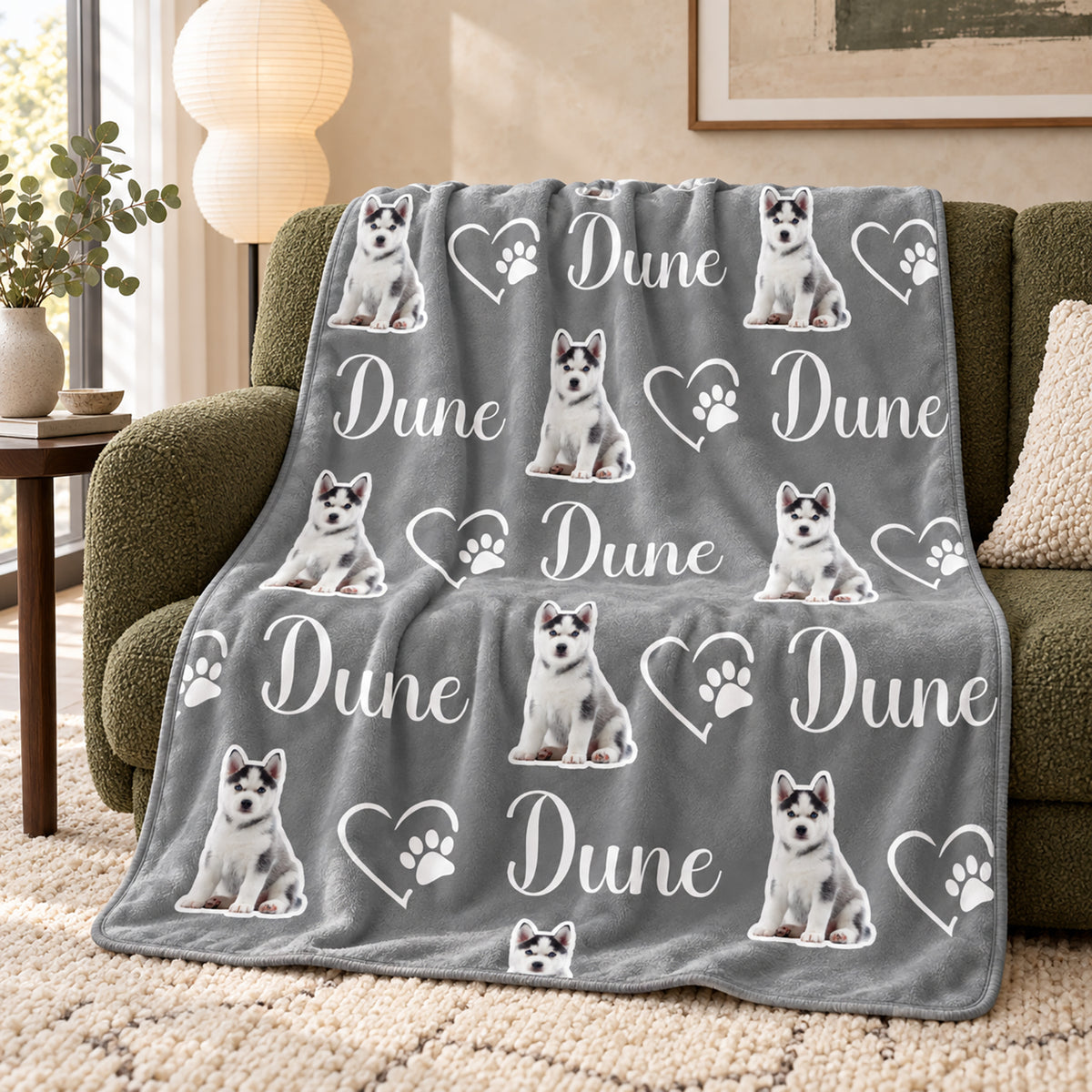 Gray personalized blanket with repeated husky puppy artwork, the name Dune, and heart paw designs
