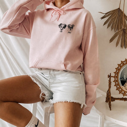 Pink hoodie with matching black-and-white pet portraits labeled Luna and Jimmy