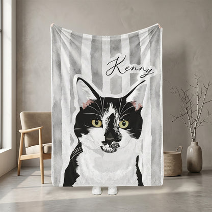 Personalized black-and-white cat portrait blanket with the name Kenny displayed in a room