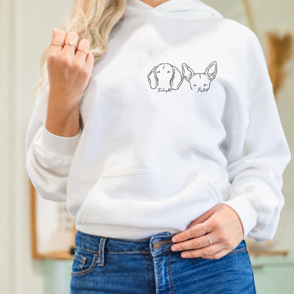 White hoodie featuring two minimalist dog line-art portraits with names