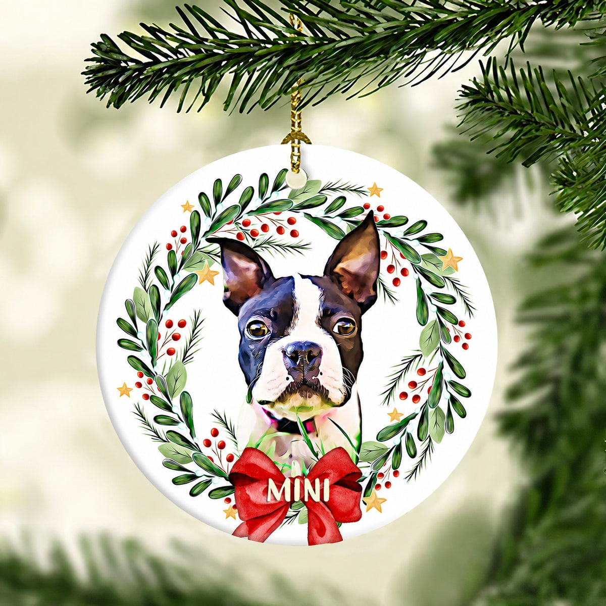 Pet portrait ornament featuring a Boston terrier surrounded by greenery, berries, stars, and a red bow