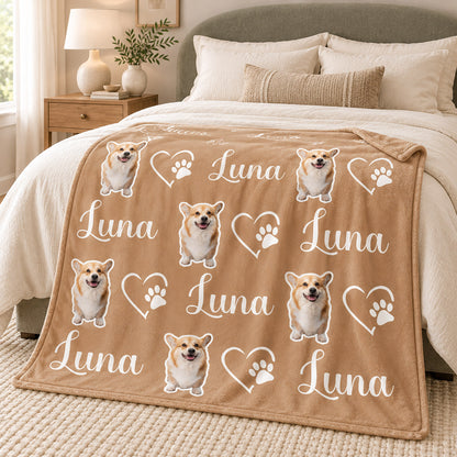 Tan personalized blanket with repeated corgi artwork, the name Luna, and heart paw designs